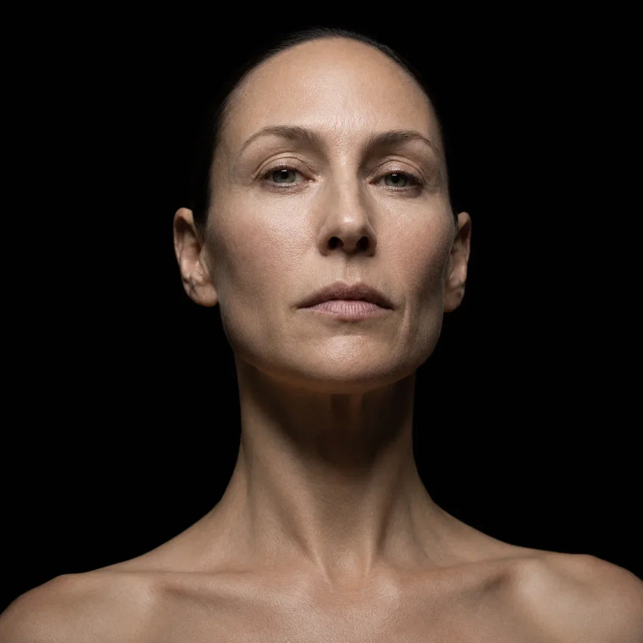 What causes facial volume loss as the face ages